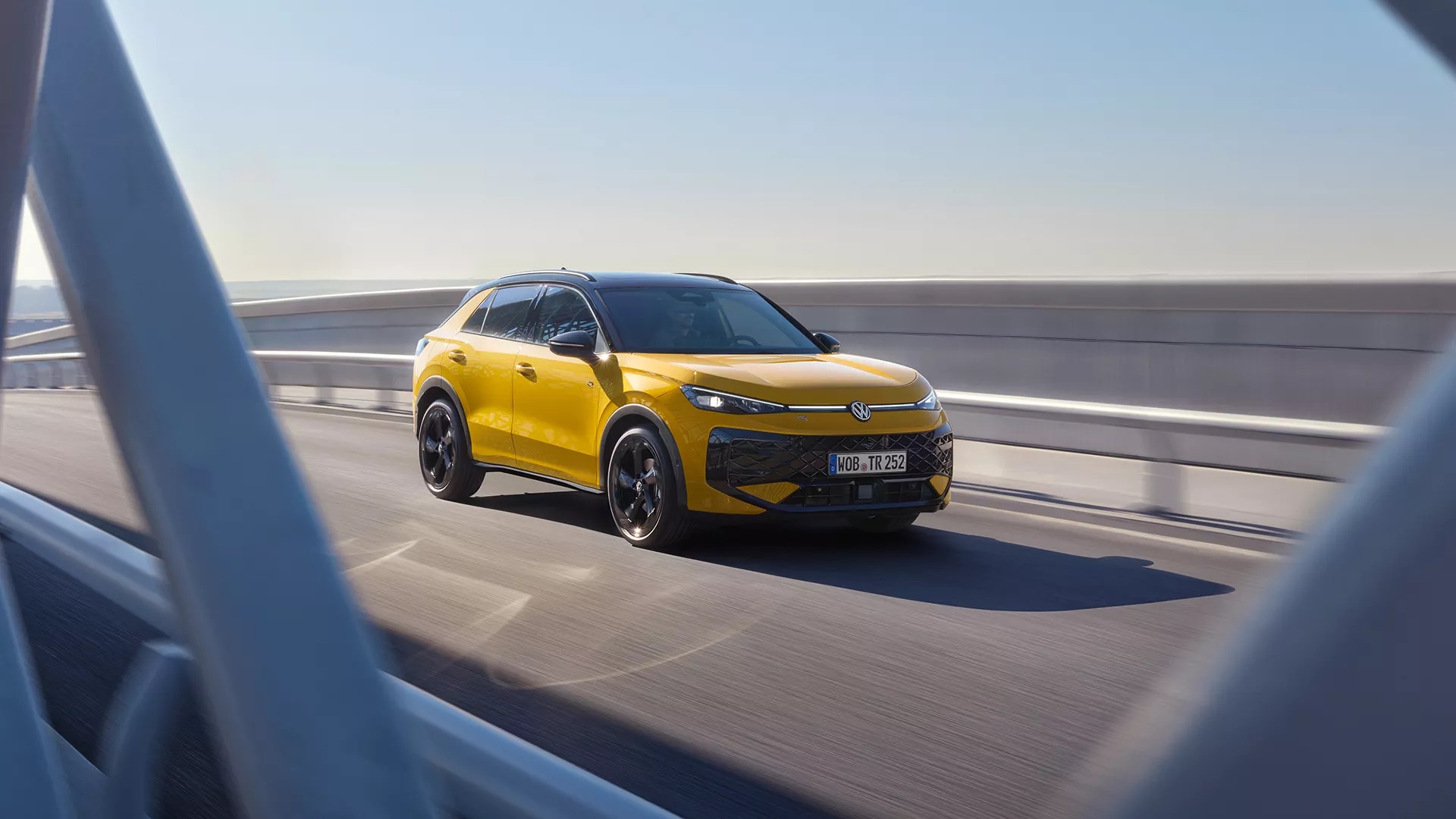 TC1279 Yellow T Roc Driving On A Bridge 1 (1)